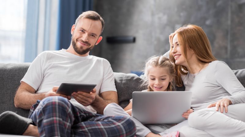 family using digital devices
